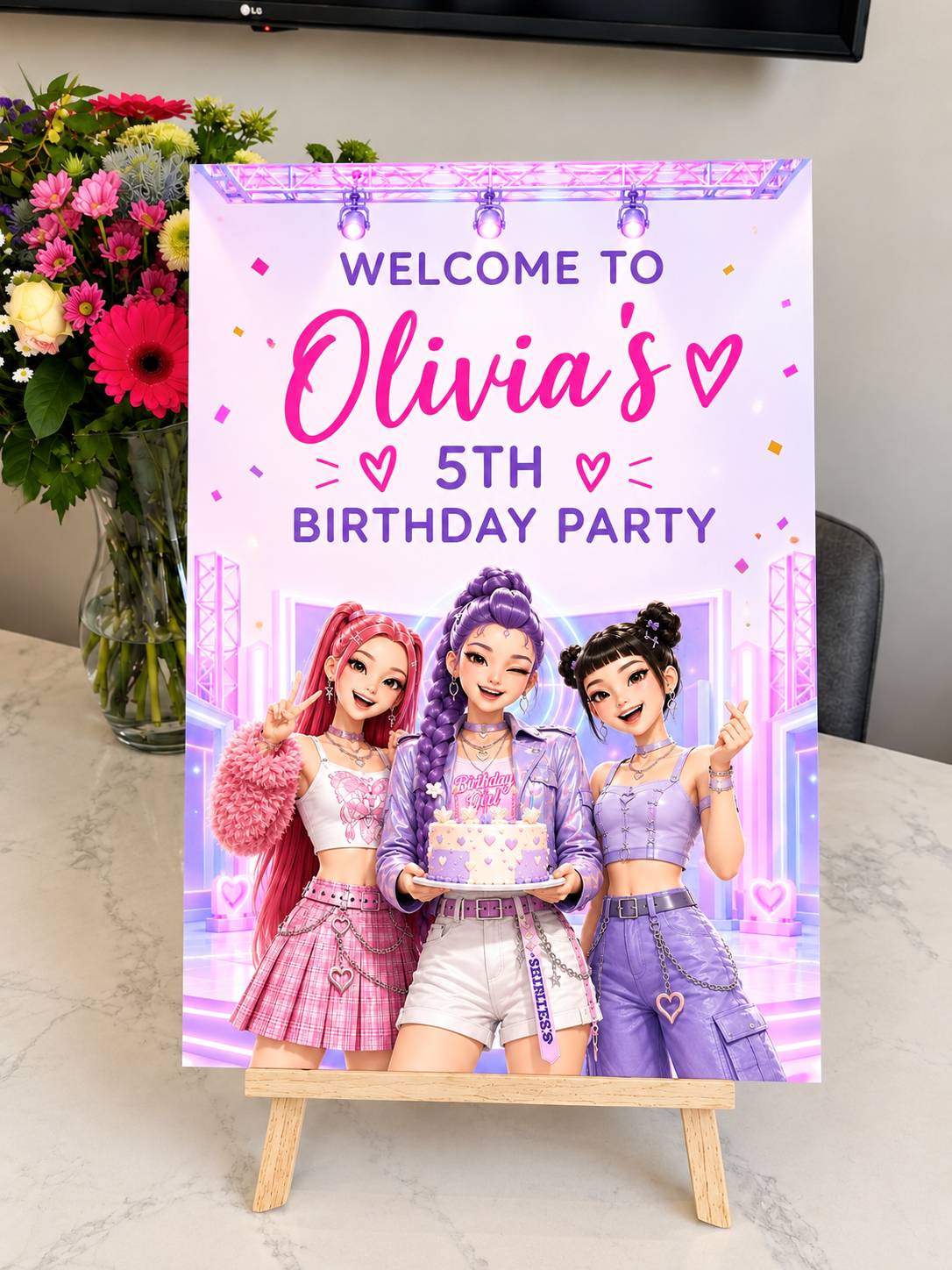 Personalised pink and purple K-pop-inspired 5th birthday welcome sign displayed on a wooden easel
