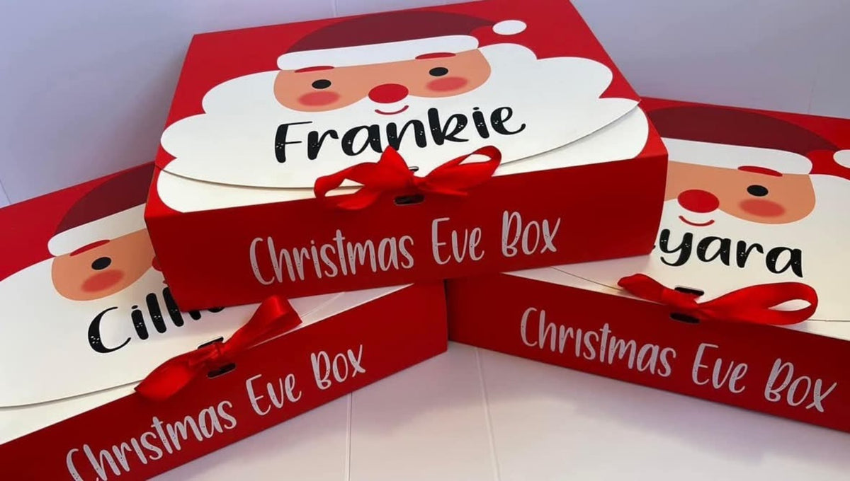 Personalised red Santa Christmas Eve box with child's name